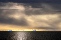 Blue icebergs in a far distance, North East  Svalbard